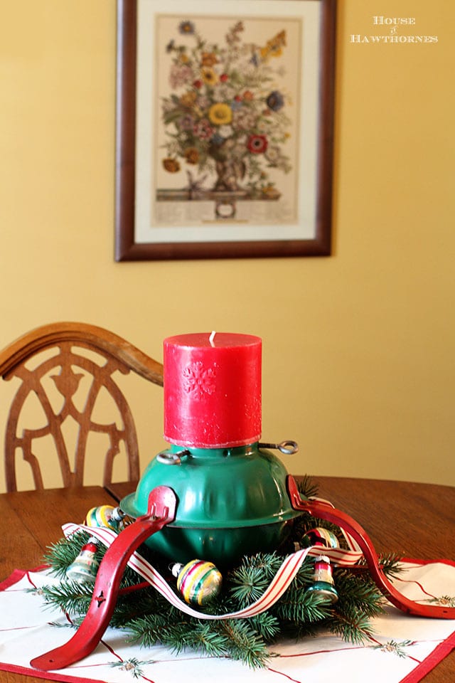 Super cute holiday candle holder repurposed from a Christmas tree stand. What a great DIY upcycle project for the holidays!