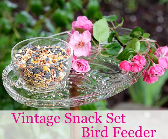 Vintage glass snack set repurposed into a bird feeder