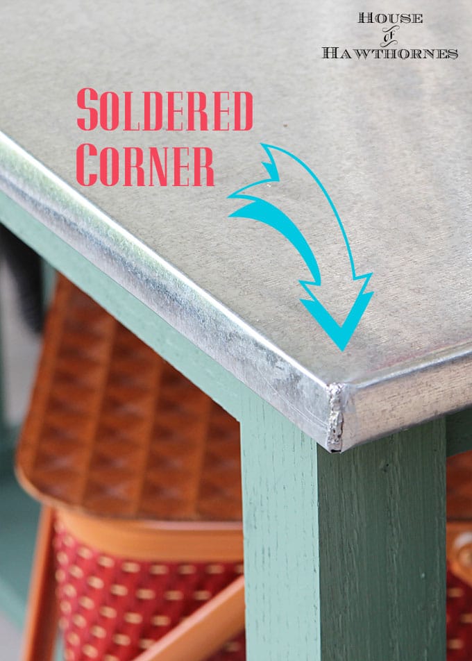 DIY instructions for making a zinc top table. Dining table could be used inside or outside. Galvanized sheet metal was used to keep the cost low.