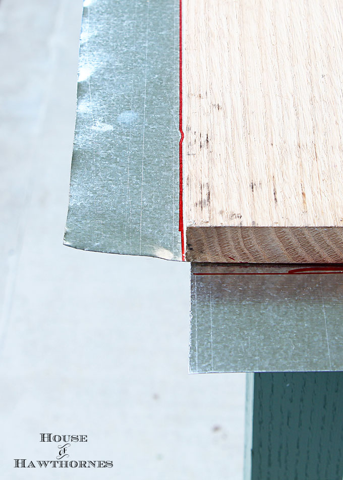 DIY instructions for making a zinc top table. Dining table could be used inside or outside. Galvanized sheet metal was used to keep the cost low.