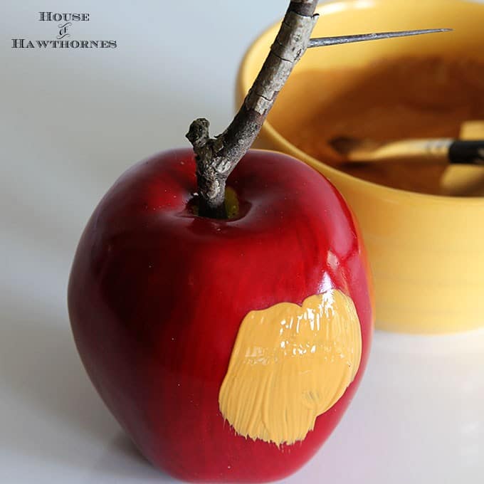 Quick and easy instruction for how to make DIY faux caramel apples for your fall decor. They are great for Halloween decorations also and they last years.