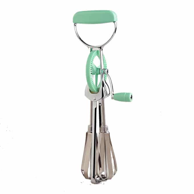Vintage styled egg beater with handle you rotate.