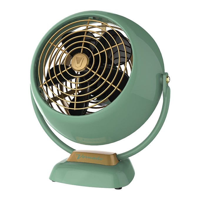 Retro style fan in a mint green color.