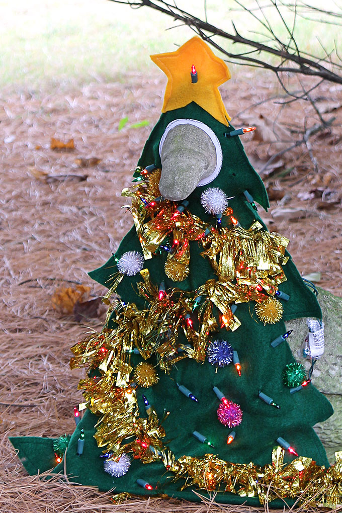 A 1990's concrete lawn goose dressed up as a Christmas tree for the holidays. Oh yeah, it's lighted. Does it get any tackier than this?