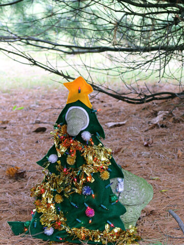 A 1990's concrete lawn goose dressed up as a Christmas tree for the holidays. Oh yeah, it's lighted. Does it get any tackier than this?