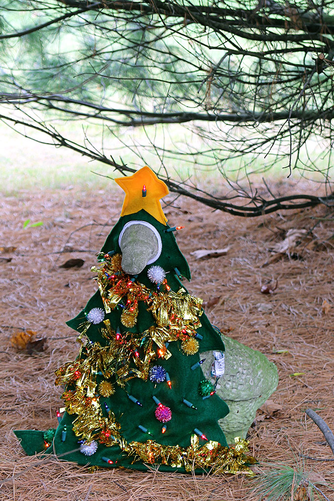 A 1990's concrete lawn goose dressed up as a Christmas tree for the holidays. Oh yeah, it's lighted. Does it get any tackier than this?