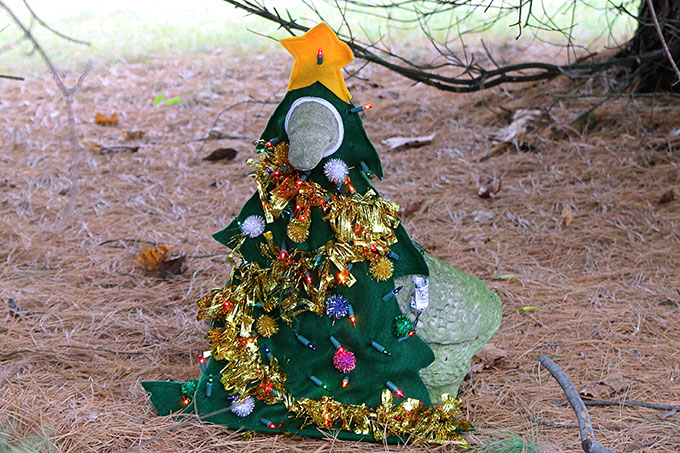 A 1990's concrete lawn goose dressed up as a Christmas tree for the holidays. Oh yeah, it's lighted. Does it get any tackier than this?