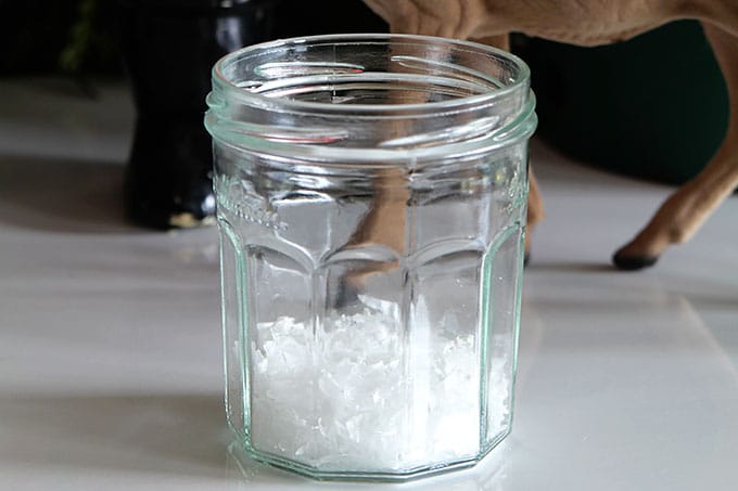 Learn how to make a super cute DIY snow globe from a jelly jar. A quick, easy and inexpensive holiday craft project the kids can help with.
