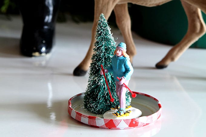A skier figurine used in a holiday snow globe. 