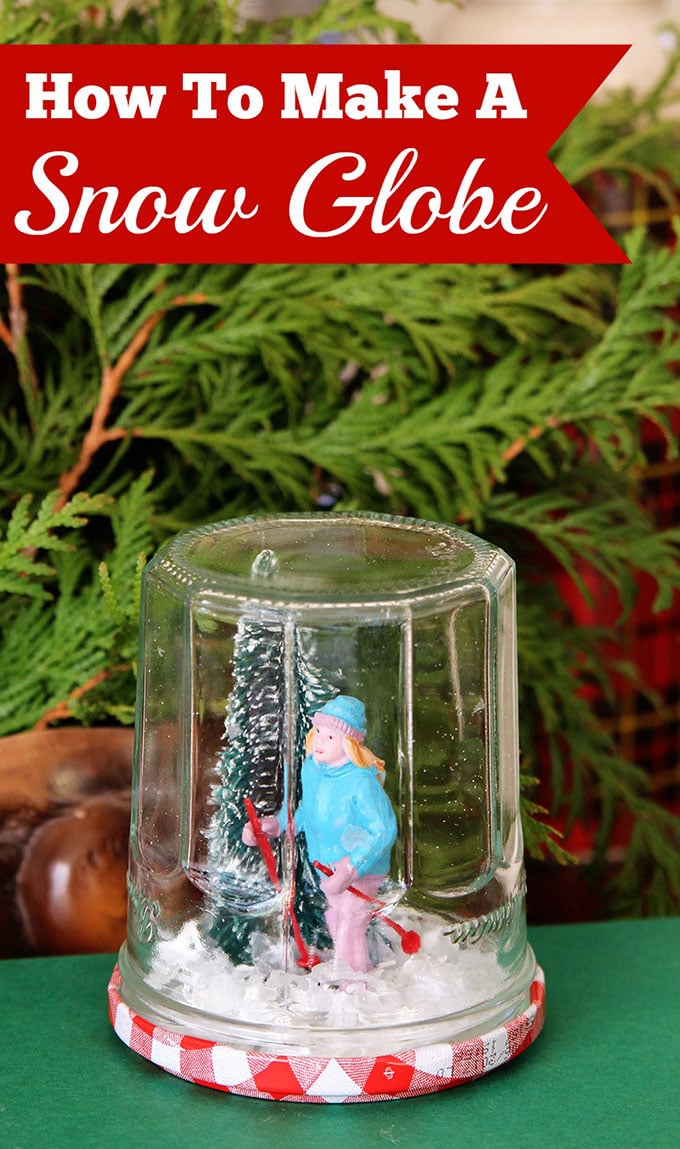Learn how to make a super cute DIY snow globe from a jelly jar. A quick, easy and inexpensive holiday craft project the kids can help with.
