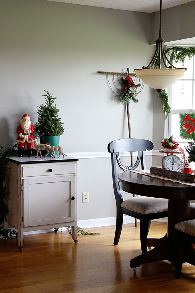 This nostalgic Christmas breakfast room is a great example of how to use vintage Christmas decor in your home without it looking like your grandma's house!