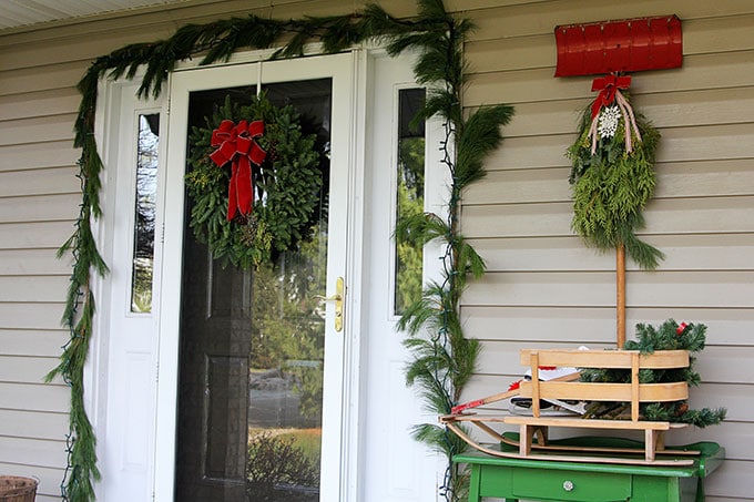 Traditional Christmas porch decor meets FUN and FUNKY! Just because you like a little red and green in your holiday decor doesn't mean it has to be boring.