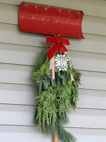 Traditional Christmas porch decor meets FUN and FUNKY! Just because you like a little red and green in your holiday decor doesn't mean it has to be boring.