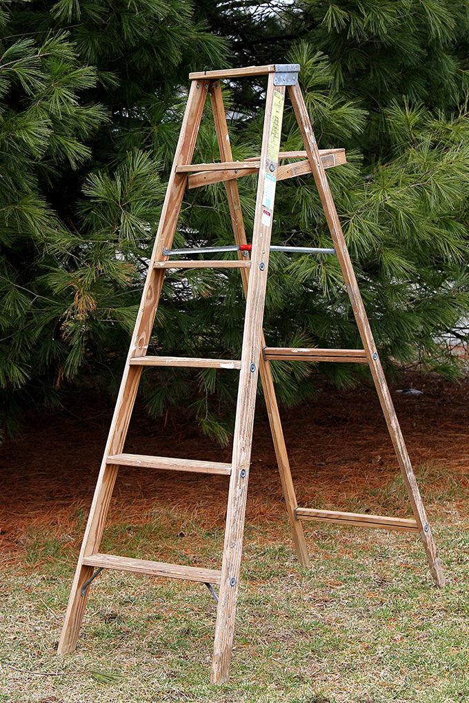 Use a wooden ladder as garden art in the flower beds this summer. They add much needed height to the garden and a place to display bird houses and planters. Use a wooden ladder as garden art in the flower beds this summer. They add much needed height to the garden and a place to display bird houses and planters.