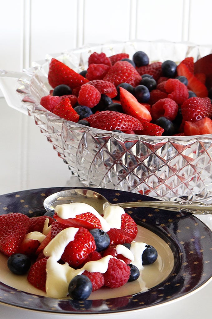 Yum! This quick and easy summer mixed berry salad with sour cream honey dressing will be the perfect healthy side dish for your next barbecue or picnic!