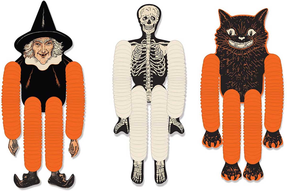 Vintage looking Beistle Halloween decor is a fun retro way to decorate for fall. Lots of traditional orange and black, witches, skeletons and black cats.