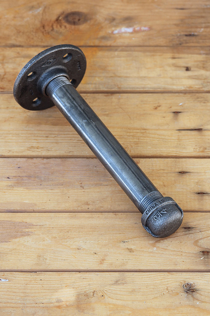 pipe fitted for a shelf