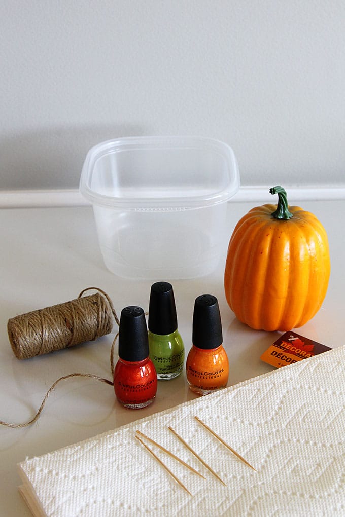How to make a marbleized pumpkin with nail polish for your fall home decor. It's quick and easy and maybe just a little bit smelly. 