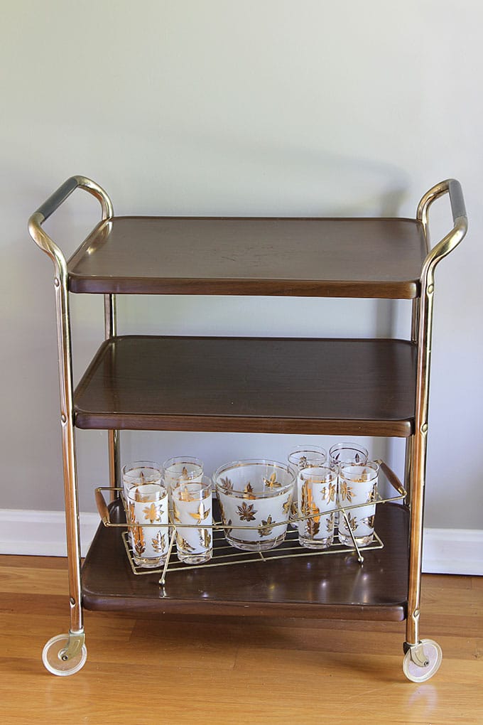 Vintage woodgrain metal kitchen cart mid-century modern design