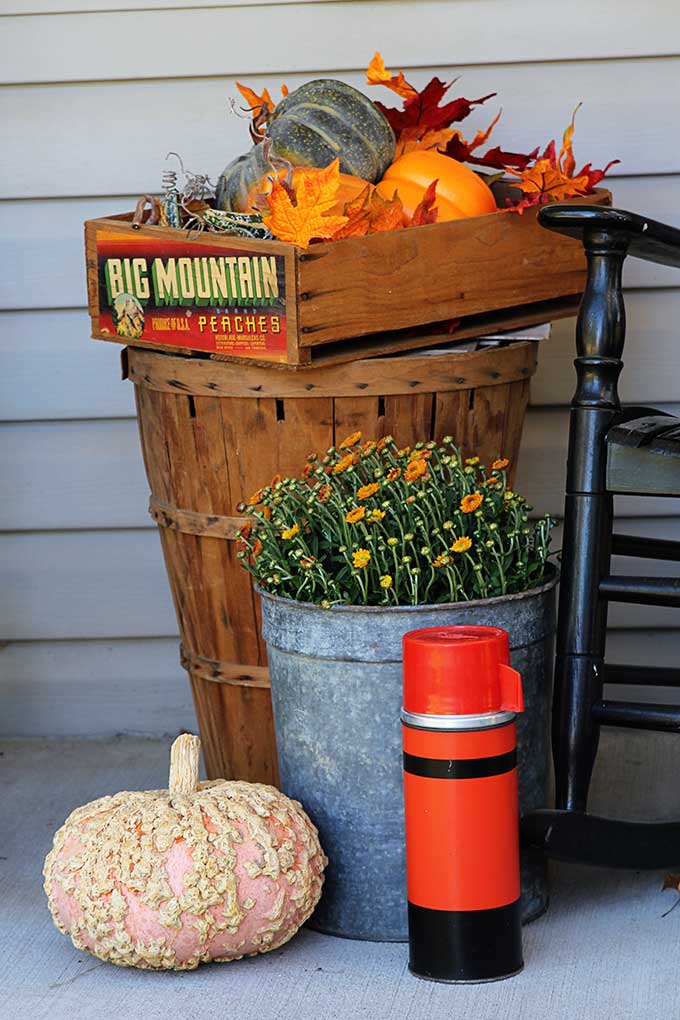 Rustic fall decor on the porch