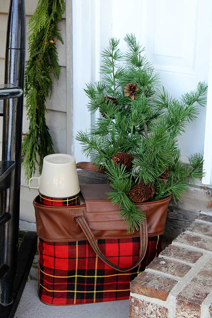 Vintage plaid Thermos picnic set used as Christmas decor