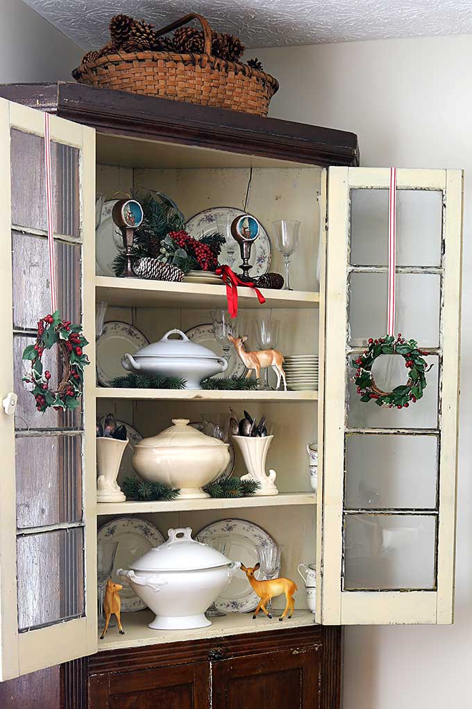 Corner cabinet decorated up for Christmas