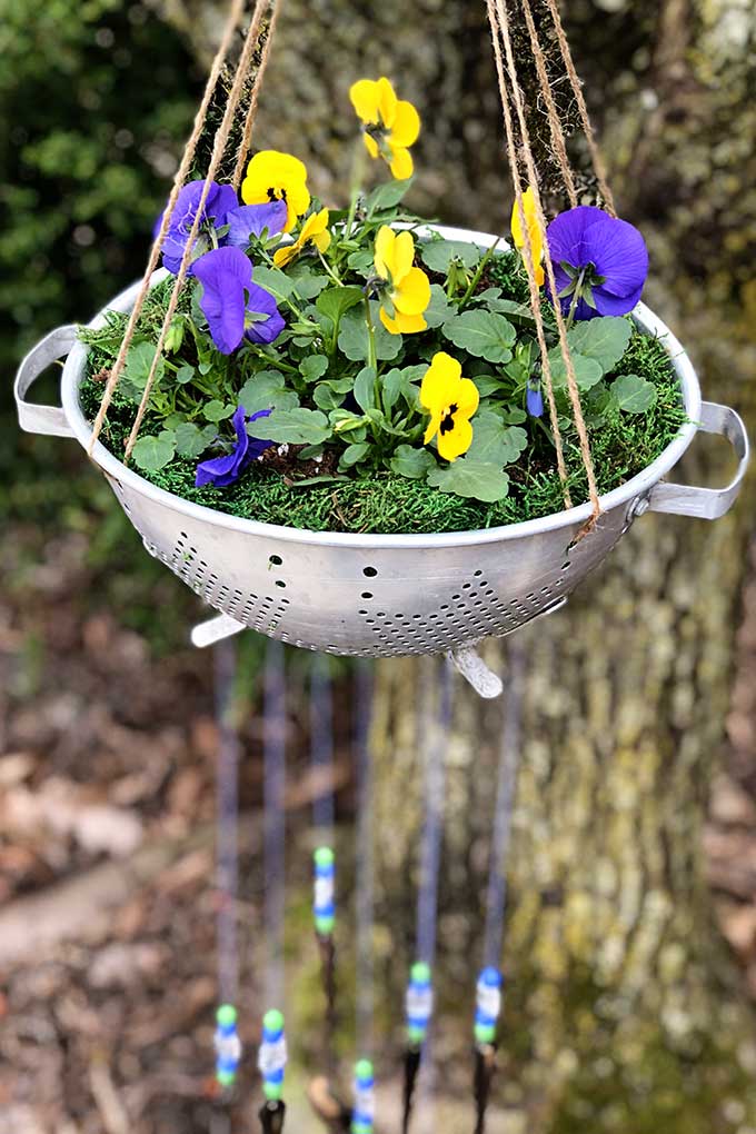 DIY silverware wind chimes with colander planter