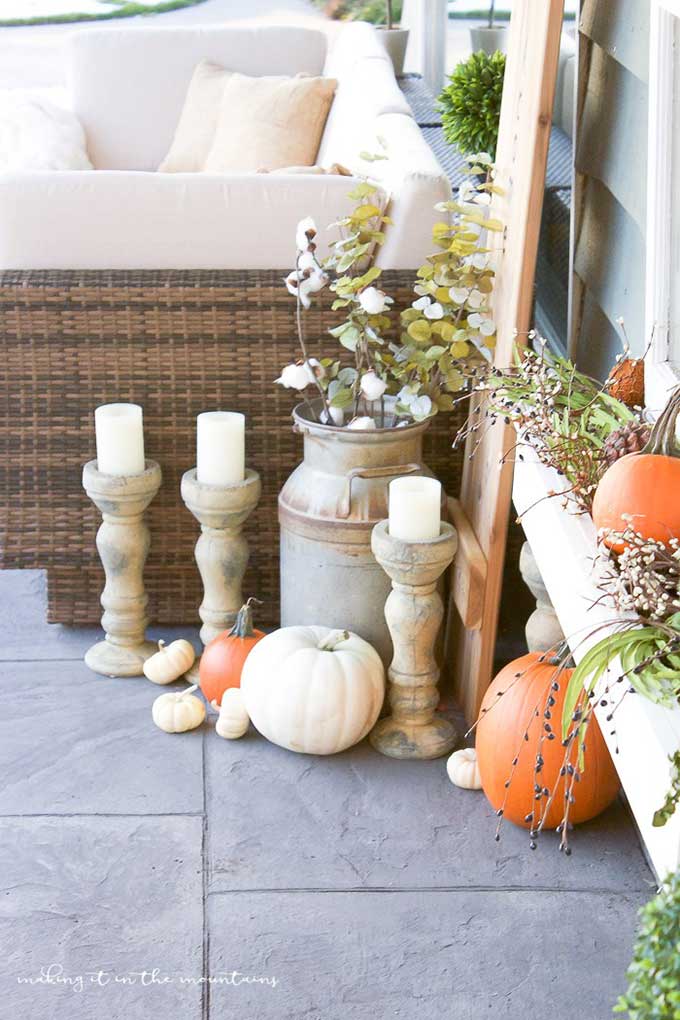 Cozy farmhouse style fall porch from Making It In The Mountains