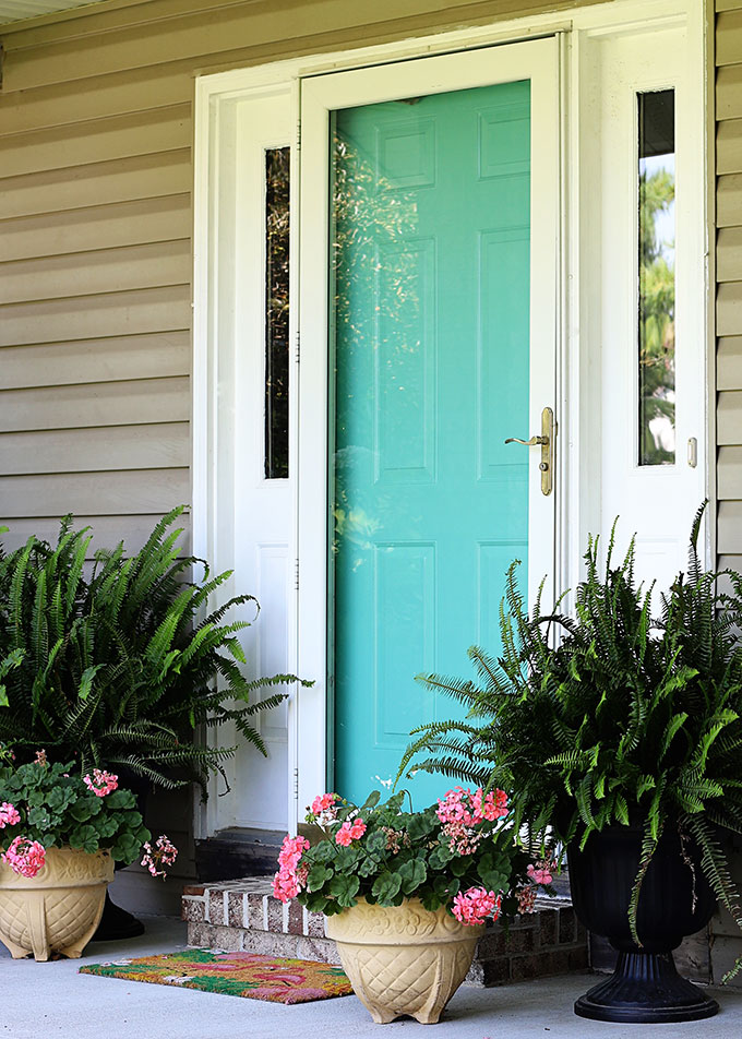 Front door painted Glidden Capri Teal