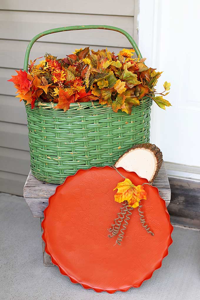 repurposing a serving tray into a pumpkin