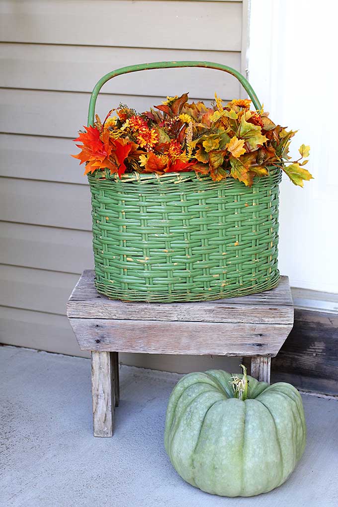 Vintage green basket with fall flowers