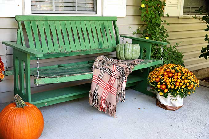 Vintage green porch glider