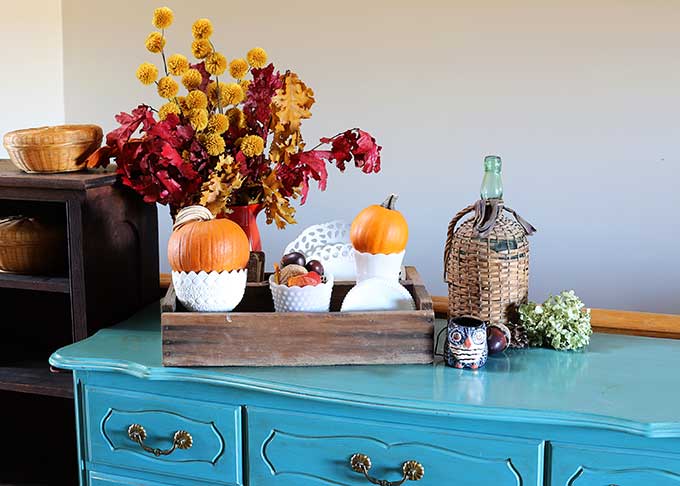 Vintage fall vignette using white milkglass