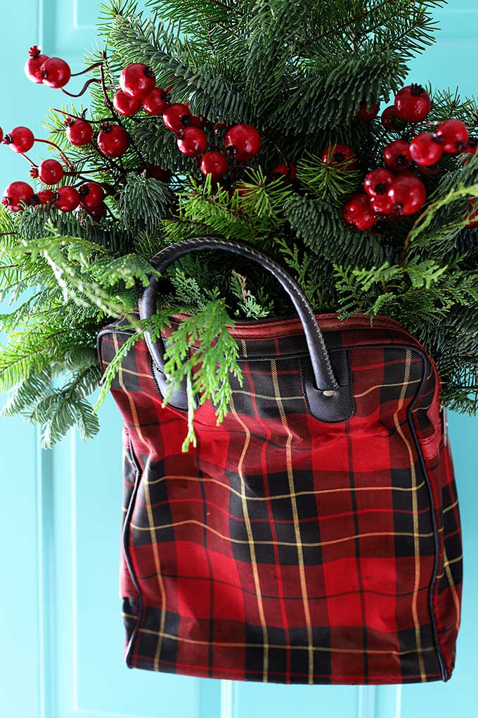 vintage plaid picnic tote used as a door wreath