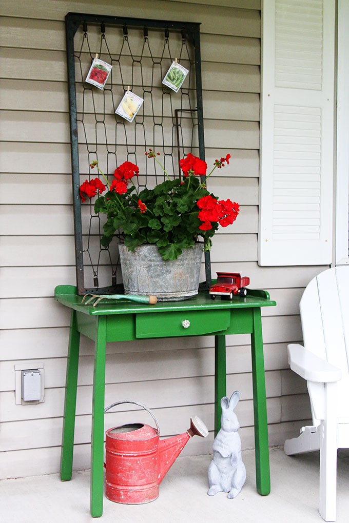 Repurposed baby bed springs turned into spring porch decor