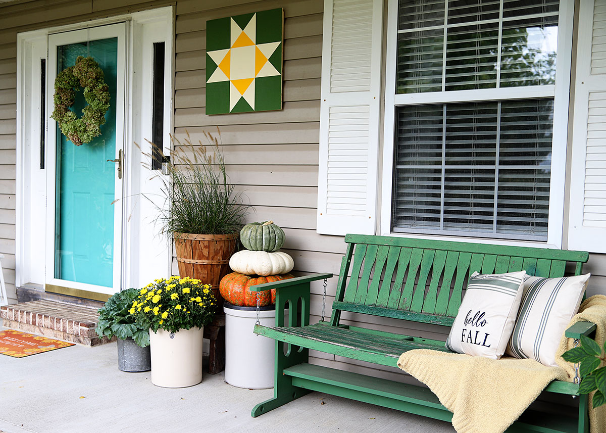 fall porch decor in green and yellow