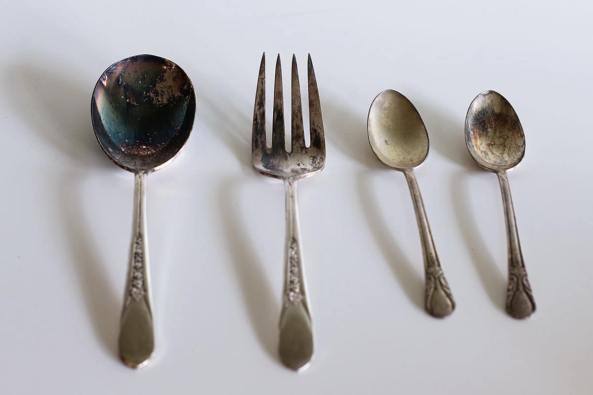 heavily tarnished silverware