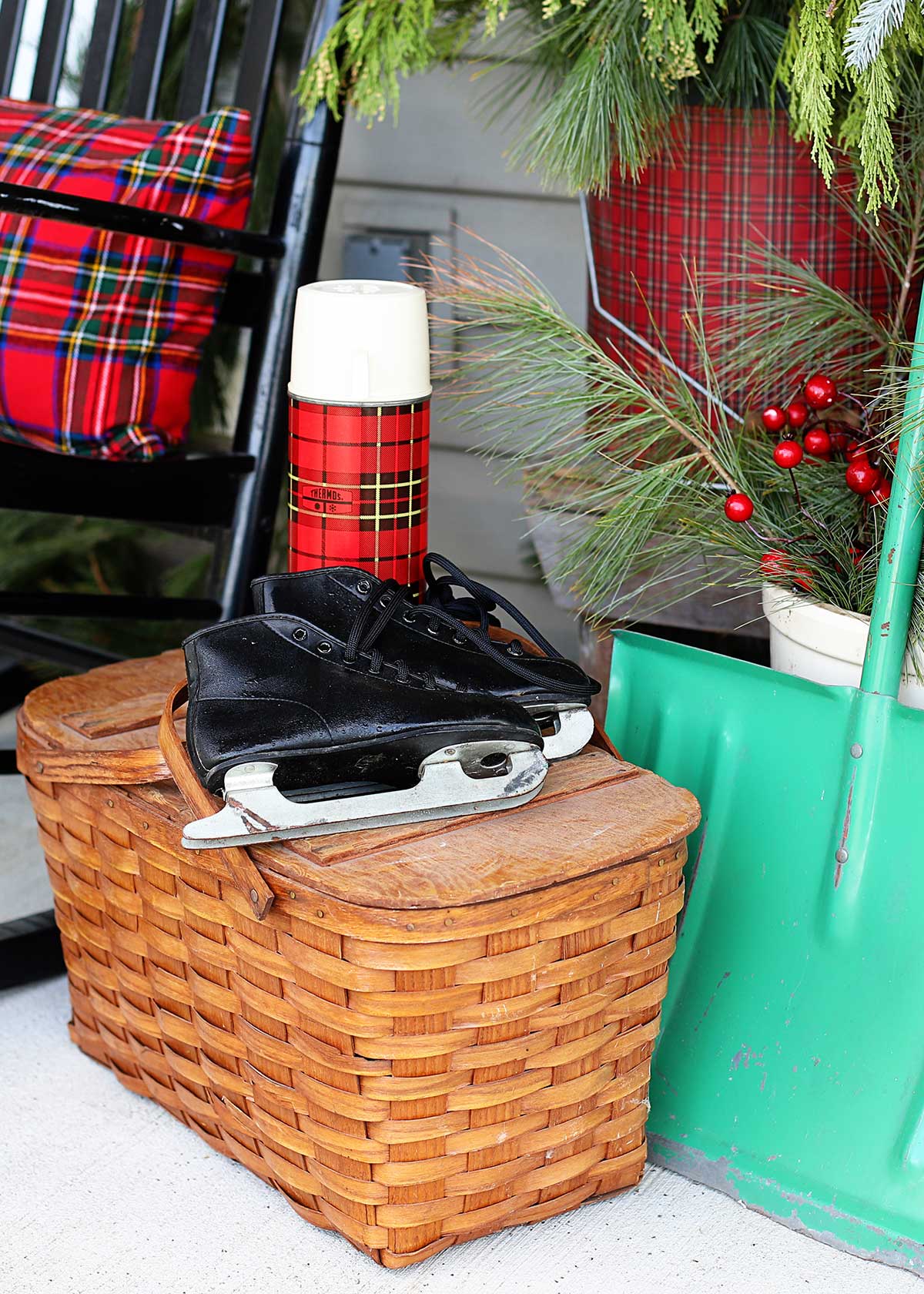 plaid on the porch used as Christmas decor