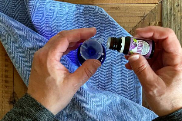 Adding essential oils to homemade poo pourri