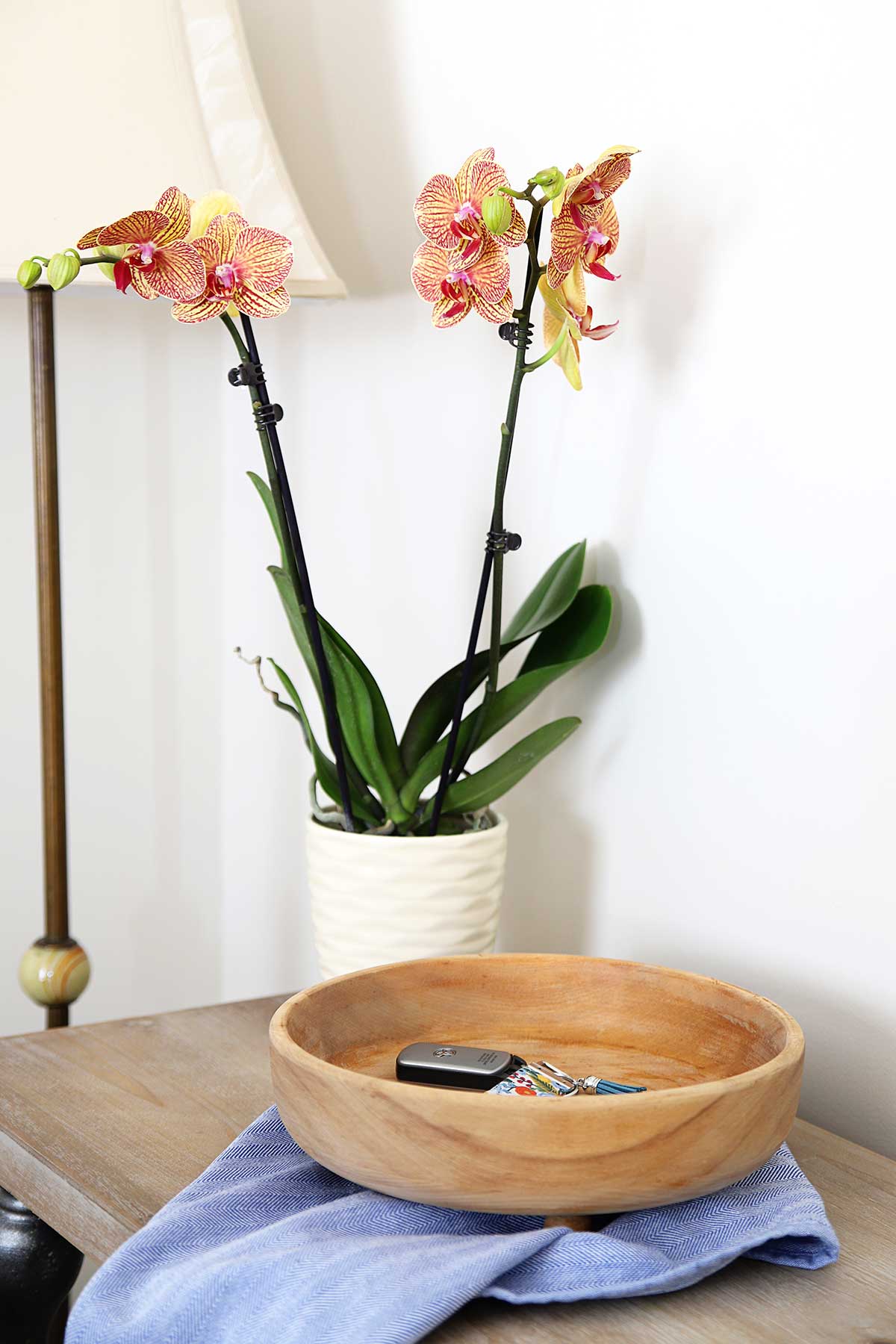 Wooden bowl upcycled for a modern farmhouse look.