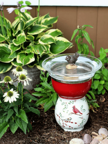 DIY bird bath made with thrift store plates and vases.