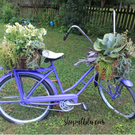 Bicycle that has been upcycled into a planter.