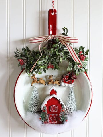 Repurposing a frying pan to be used as a Christmas decoration.