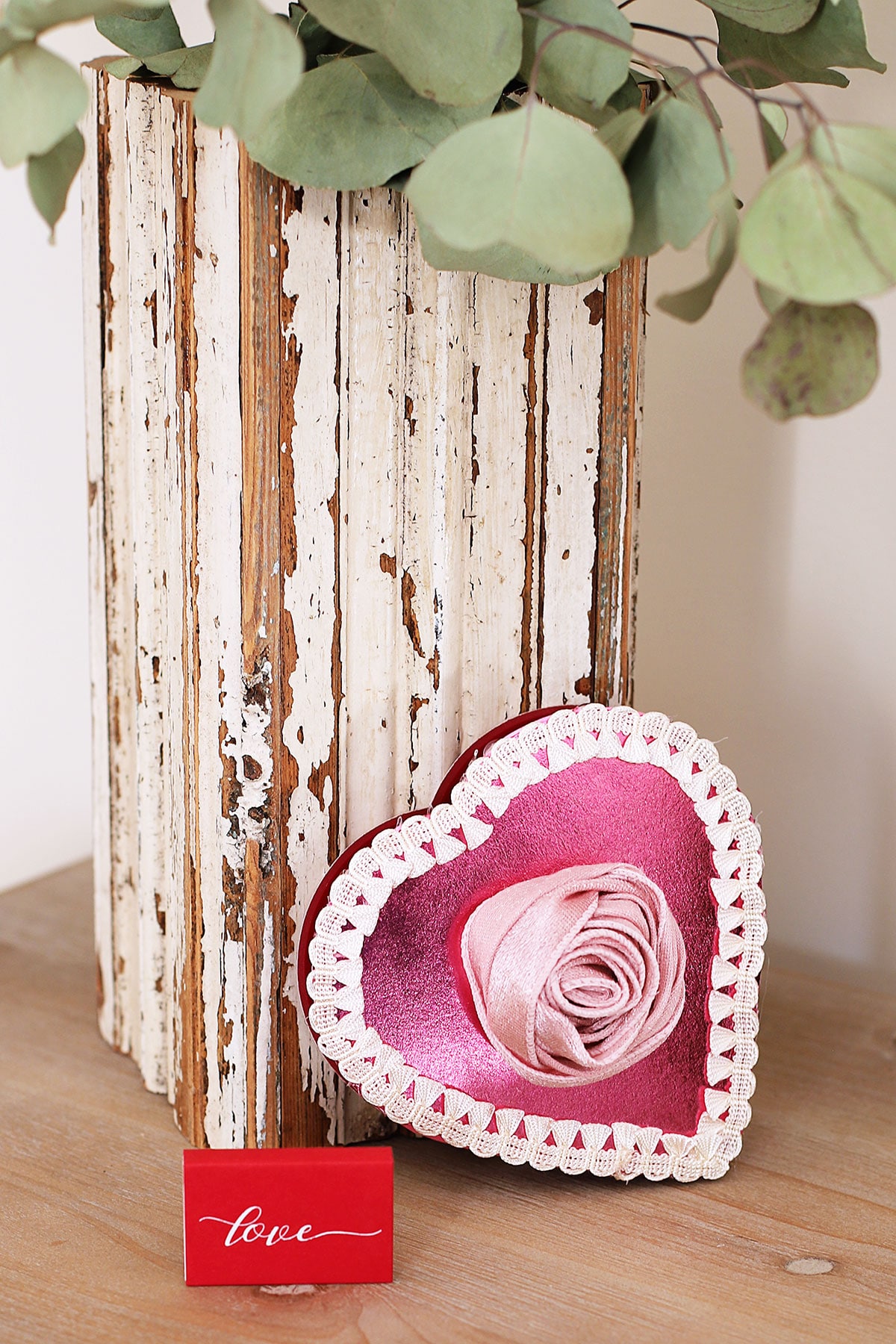 Vintage inspired candy box with pink rose made from a ribbon.
