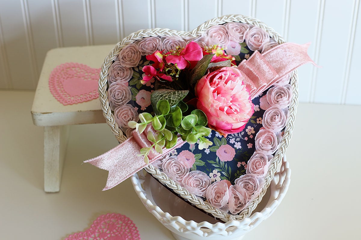 Vintage inspired candy box for Valentine's Day with lots of flowered lace and fabric peonies.