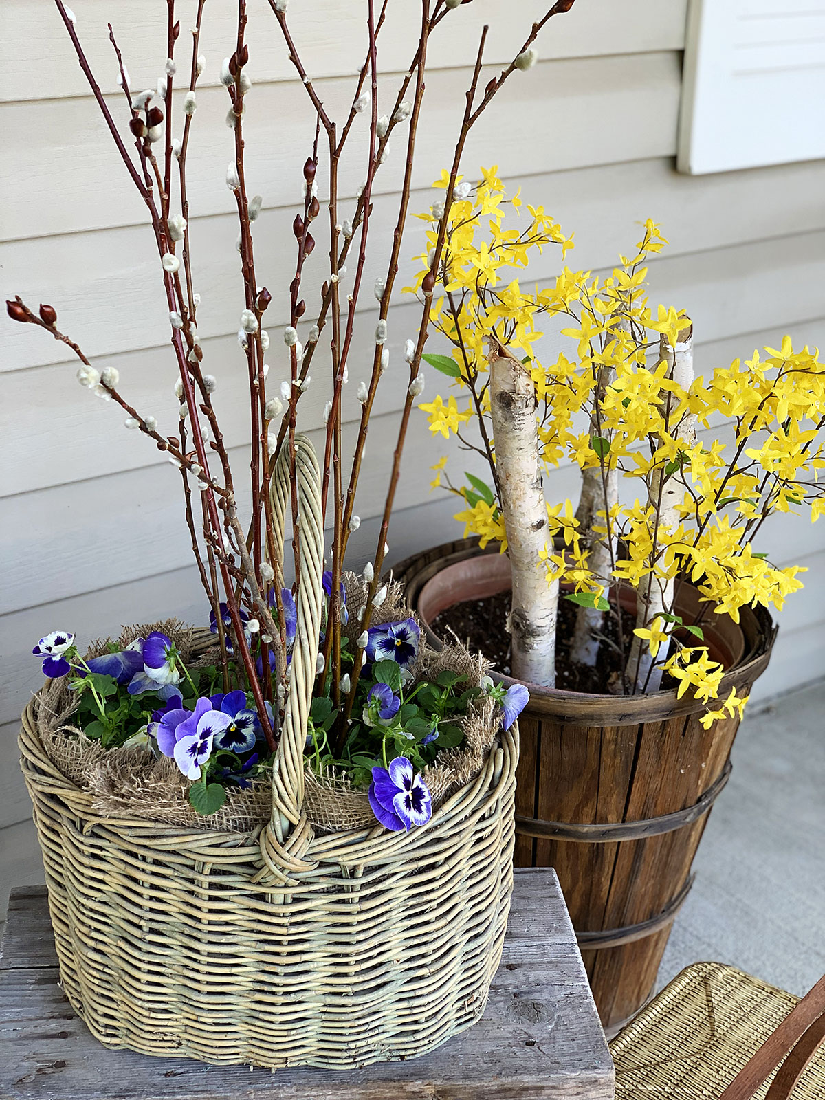 Purple pansies planted in a basket.