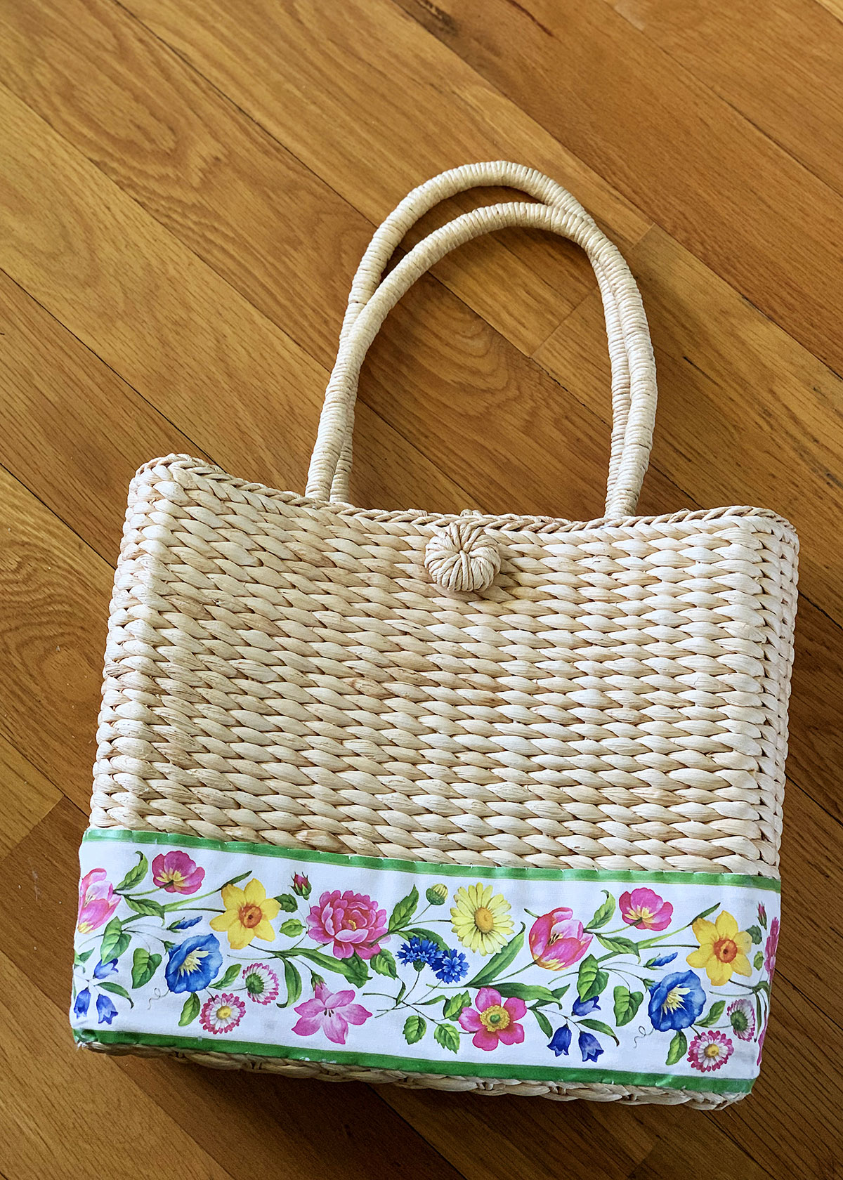 Claire Murray purse with flowered trim.