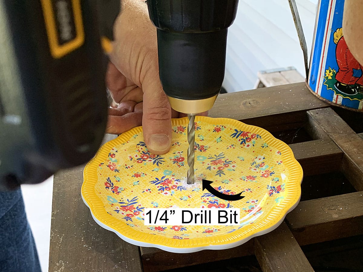 Using the ¼" drill bit drill your final hole in the plate.