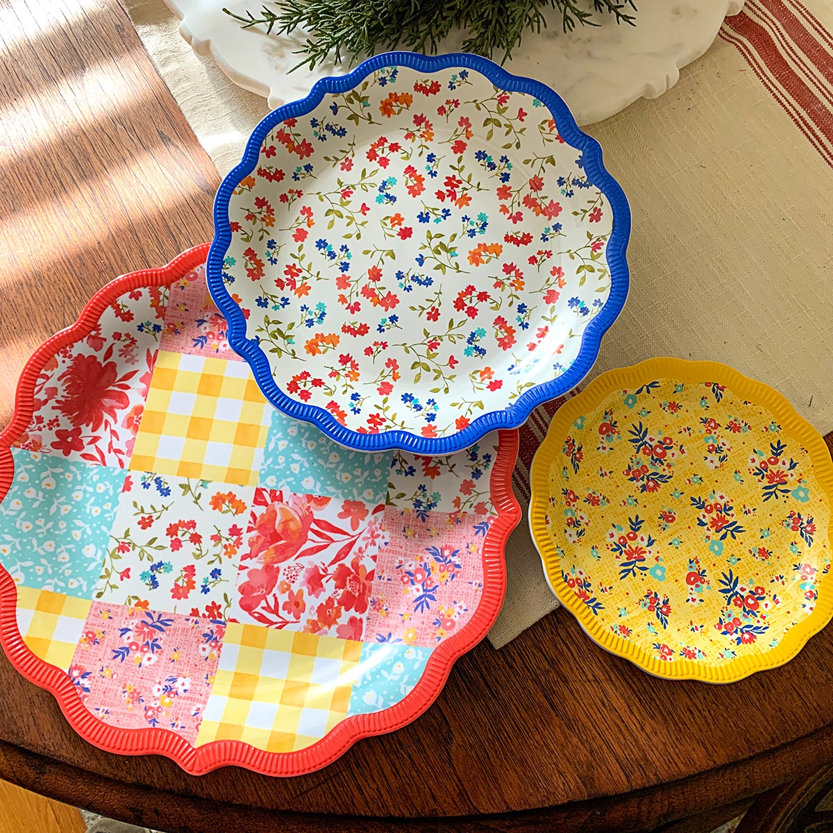 Pioneer Woman Patchwork Medley Melamine Dinner Plates used as a tiered serving tray.