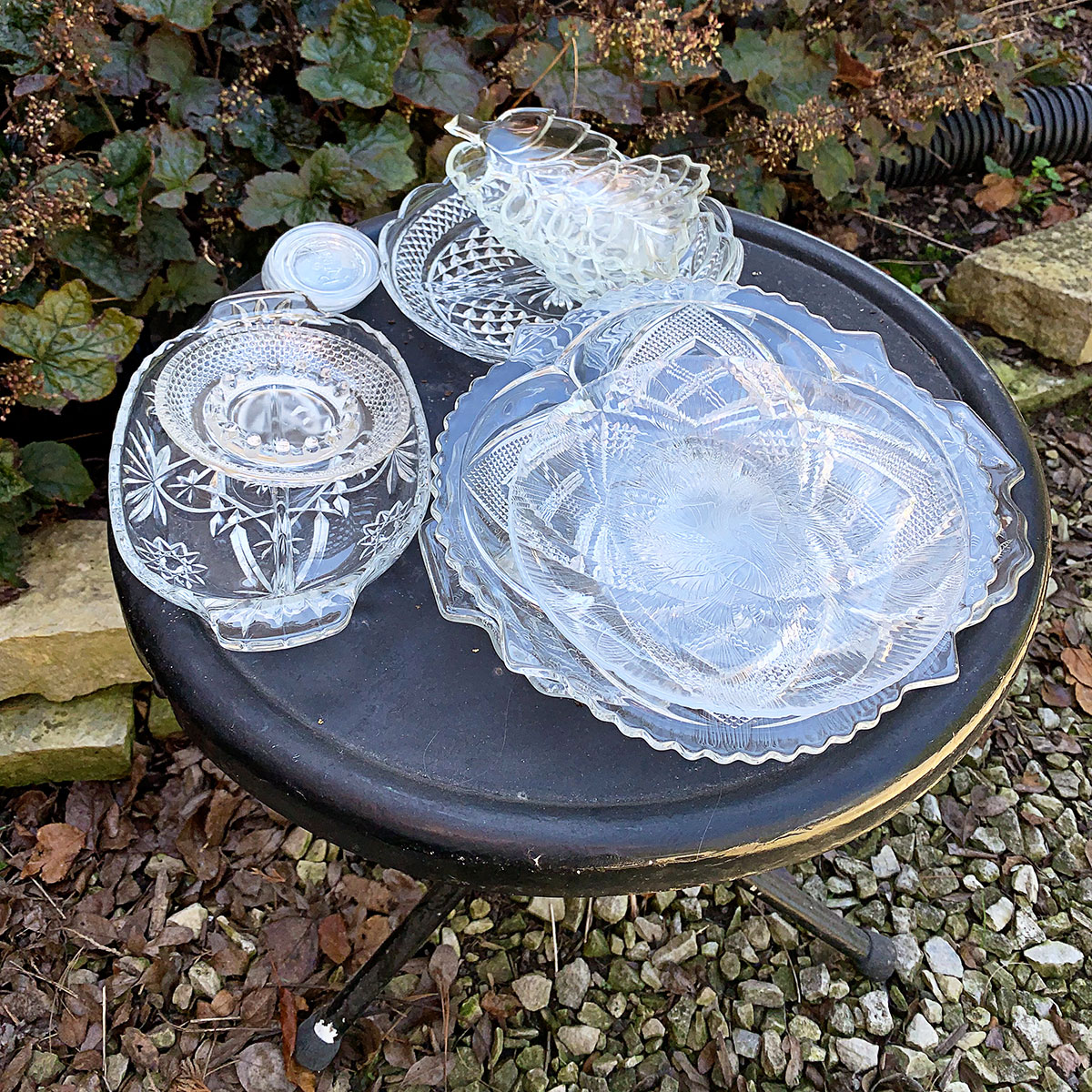 Pressed glass plates and bowls from the thrift store.